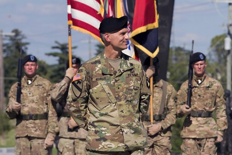 Brig. Gen. John E. Novalis II, deputy commanding general for support, 101st Airborne Division (Air Assault), stands before a formation of Screaming Eagles while being welcomed by Maj. Gen. Gary J. Volesky, commanding general of the 101st and Fort Campbell, Ky., during an Honor Eagle ceremony outside the division headquarters building, Fort Campbell, Aug. 12, 2015.(Staff Sgt. Matthew W. Ard, 101st Airborne Division (Air Assault) Public Affairs)