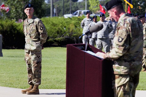 Brig. Gen. John E. Novalis II, deputy commanding general for support, 101st Airborne Division (Air Assault), stands before a formation of Screaming Eagles while being welcomed by Maj. Gen. Gary J. Volesky, commanding general of the 101st and Fort Campbell, Ky., during an Honor Eagle ceremony outside the division headquarters building at Fort Campbell, Aug. 12, 2015. (Staff Sgt. Matthew W. Ard, 101st Airborne Division (Air Assault) Public Affairs)