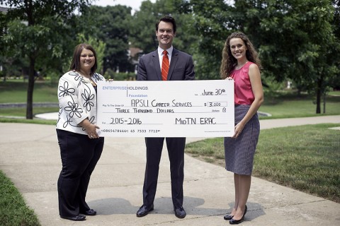 Ryan Smithson presents a $3,000 donation on behalf of the Enterprise Holdings Foundation to Amanda Walker, director of APSU Career Services, and Megan Brown, assistant director of APSU Career Services. (Taylor Slifko/APSU)