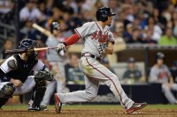 Atlanta Braves second baseman Jace Peterson (8) hits an RBI single during the ninth inning against the San Diego Padres at Petco Park. (Jake Roth-USA TODAY Sports)