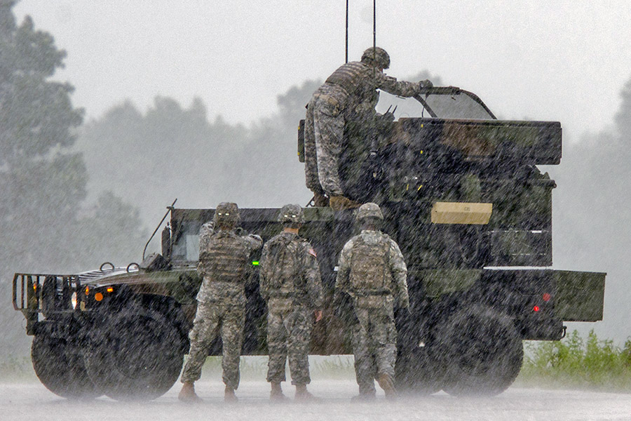 Soldiers with 2nd Battalion, 44th Air Defense Artillery Regiment, 101st Airborne Division (Air Assault) Sustainment Brigade, work on an Avenger air defense system during an Avenger ground gunnery range held Aug. 19 at Fort Campbell, Ky. Despite periods of heavy rain, Soldiers with 2-44 ADA successfully completed their training to become certified on the Avenger systems. (Spc. Joseph Green 101st Sustainment Brigade, 101st Airborne Division (AA) Public Affairs)