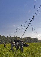 Soldiers with the 58th Signal Company, 101st Special Troops Battalion, 101st Airborne Division (Air Assault) Sustainment Brigade, set up an antenna during a field training exercise in the training area of Fort Campbell, Ky., Aug. 12, 2015. (Sgt. 1st Class Mary Rose Mittlesteadt, 101st Airborne Division (Air Assault) Sustainment Brigade Public Affairs)