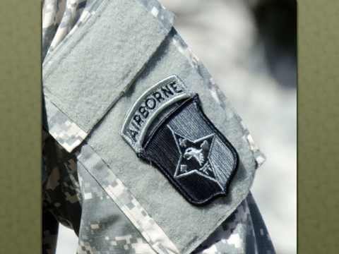 A Soldier wears the 101st Sustainment Brigade, 101st Airborne Division (Air Assault), patch before the brigade cased its colors and uncased new colors in a ceremony to symbolized the brigade’s re-designation as the 101st Abn. Div. Sust. Bde., July 30, 2015, at Fort Campbell, Ky. It also served as a patching ceremony, where the Soldiers of the 'Lifeliners' Brigade donned the very familiar 'Old Abe,' the 101st Abn. Div. patch. (Spc. Joseph Green, 101st Sustainment Brigade, 101st Airborne Division (Air Assault) Public Affairs)