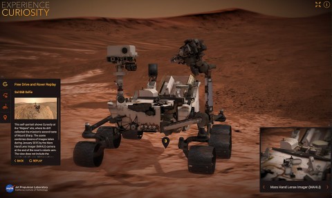 A screen capture from NASA's new Experience Curiosity website shows the rover in the process of taking its own self-portrait. (NASA/JPL-Caltech)