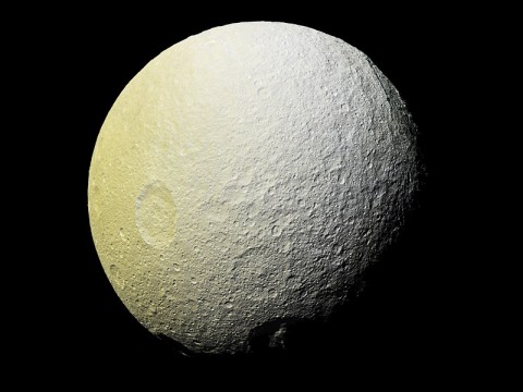 This enhanced-color mosaic of Saturn's icy moon Tethys shows a range of features on the moon's trailing hemisphere. Tethys is tidally locked to Saturn, so the trailing hemisphere is the side of the moon that always faces opposite its direction of motion as it orbits the planet. (NASA/JPL-Caltech/Space Science Institute)