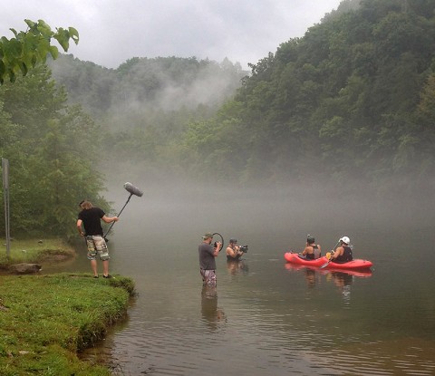 The “Tennessee Uncharted” crew films a segment with host Erick Baker (front, in canoe). The program, which launched late in 2014, won first place for an outdoors series as awarded by the Association for Conservation Information (ACI).