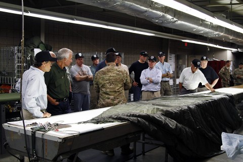 Community leaders from Middle Tennessee and Southwestern Kentucky receive an orientation to a parachute rigging facility as part of the Green Beret for a Day on Aug. 22, 2015, at Fort Campbell, Ky. (Sgt. Justin Moeller, 5th Special Forces Group (Airborne) Public Affairs Office)