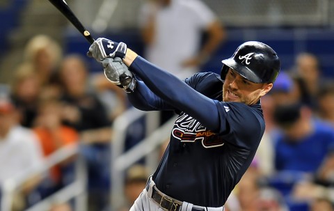 Atlanta Braves first baseman Freddie Freeman (5) connects for a base hit during the first inning against the Miami Marlins at Marlins Park. (Steve Mitchell-USA TODAY Sports)