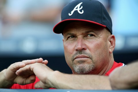 Atlanta Braves manager Fredi Gonzalez (33) looks on from the dugout prior to the game against the   Arizona Diamondbacks at Turner Field. (Jason Getz-USA TODAY Sports)