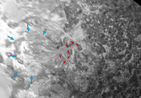 Intricate Valley Glaciers on Pluto: This image covers the same region as the image above, but is re-projected from the oblique, backlit view shown in the new crescent image of Pluto. The backlighting highlights the intricate flow lines on the glaciers. The flow front of the ice moving into the informally named Sputnik Planum is outlined by the blue arrows. NASA/JHUAPL/SwRI)