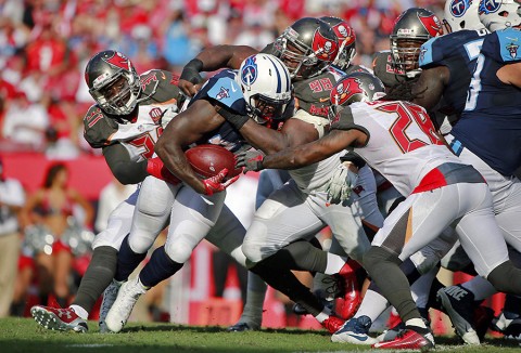 Tampa Bay Buccaneers defensive tackle Clinton McDonald (98) tackles Tennessee Titans running back Terrance West (35) during the first half at Raymond James Stadium. (Kim Klement-USA TODAY Sports)