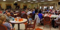 Soldiers, Family and Veterans of the 5th Special Forces Group (Airborne), listen to Dr. Stu Weber, an author and former Captain in the 5th SFG(A), during the 54th Reunion prayer breakfast at the Oasis Dining Facility on Sept. 16, 2015, at Fort Campbell, Ky.