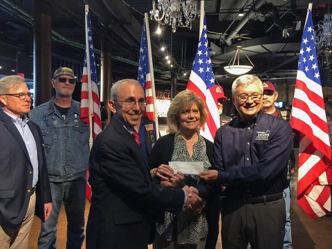 Mike Goodwin, Project Director for Campbell Crossing, presents a check to Nashville Connection- Heroes Salute on behalf of the Lend Lease (US) Community Fund.