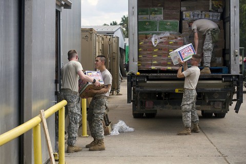 Food service specialist and kitchen police from 2nd Brigade Combat Team, 101st Airborne Division (Air Assault) and supporting units unload fresh fruit into a walk-in freezer at the intermediate staging base at Fort Polk, La., Sept. 25, 2015. (Staff Sgt. Terrance D. Rhodes, 2nd Brigade Combat Team, 101st Airborne Division (Air Assault) Public Affairs)