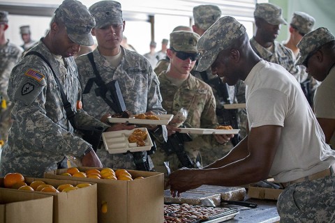 Sgt. 1st Class Trerilski Davis, the culinary management noncommissioned officer, from Wadley, Ga., with Company E, 39th Brigade Engineer Battalion, 2nd Brigade Combat Team, 101st Airborne Division (Air Assault) serves hot lunch chow at the intermediate staging base at Fort Polk, La., Sept. 25, 2015. (Staff Sgt. Terrance D. Rhodes, 2nd Brigade Combat Team, 101st Airborne Division (Air Assault) Public Affairs)