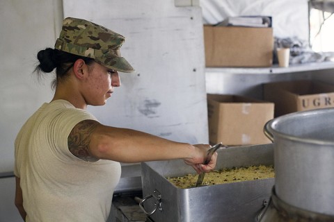 Spc. Erica Mann, a food service specialist with, from Modesto, Calif., with 2nd Battalion, 502th Infantry Regiment, 2nd Brigade Combat Team, 101st Airborne Division (Air Assault) prepares dinner chow at the intermediate staging base in support of the “Strike” Brigade’s Joint Readiness Training Center rotation 16-01, Fort Polk, La., Sept. 26, 2015. (Staff Sgt. Terrance D. Rhodes, 2nd Brigade Combat Team, 101st Airborne Division (Air Assault) Public Affairs)