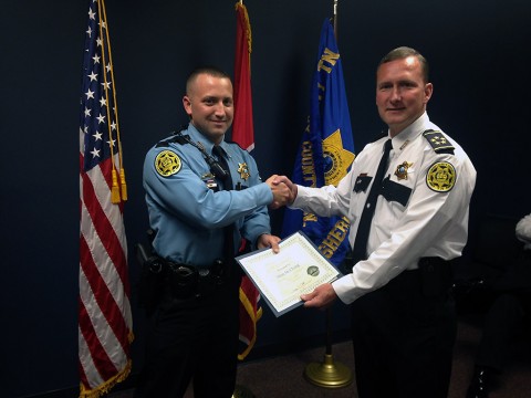 Montgomery County Sheriff John Fuson (r) congratulates Deputy Jason McClung (l) on his success at Level 1 Basic Sniper School.