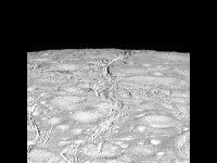 NASA’s Cassini spacecraft zoomed by Saturn’s icy moon Enceladus on Oct. 14, 2015, capturing this stunning image of the moon’s north pole. A companion view from the wide-angle camera (PIA20010) shows a zoomed out view of the same region for context. (NASA/JPL-Caltech/Space Science Institute)