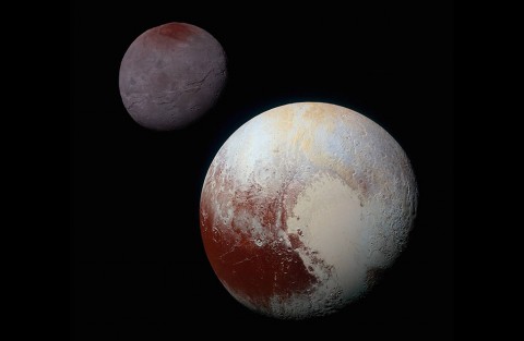 This composite of enhanced color images of Pluto (lower right) and Charon (upper left), was taken by NASA’s New Horizons spacecraft as it passed through the Pluto system on July 14, 2015. This image highlights the striking differences between Pluto and Charon. The color and brightness of both Pluto and Charon have been processed identically to allow direct comparison of their surface properties, and to highlight the similarity between Charon’s polar red terrain and Pluto’s equatorial red terrain. (NASA/JHUAPL/SwRI)