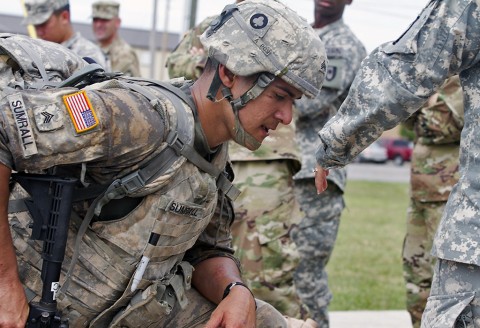 Sgt. Gaines Sumrall, a medic with 101st Airborne Division Artillery, takes a breather after finishing the final foot march of the 101st Airborne Division Best Medic Competition at Fort Campbell, Ky., Sept. 25, 2015. Sumrell, a Beaufort, S.C., native, will represent the 101st Airborne Division with his teammate, Spc. Kyle Little, at the Command Sgt. Maj. Jack L. Clark Jr. Best Medic Competition in Fort Sam Houston, Texas, in November. (Sgt. William White, 101st Airborne Division (Air Assault) Public Affairs)