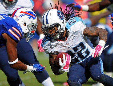 Tennessee Titans running back Dexter McCluster (22) is stopped by Buffalo Bills receiver Robert Woods (10) after a punt return during the second half at Nissan Stadium. The Bills won 14-13. (Christopher Hanewinckel-USA TODAY Sports)