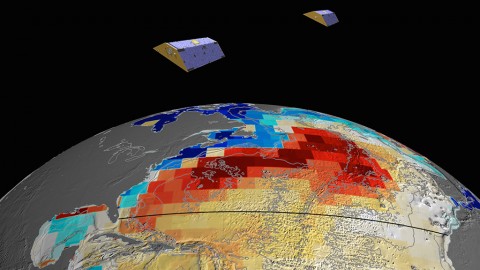 NASA's GRACE satellites (artist's concept) measured Atlantic Ocean bottom pressure as an indicator of deep ocean current speed. In 2009, this pattern of above-average (blue) and below-average (red) seafloor pressure revealed a temporary slowing of the deep currents. (NASA/JPL-Caltech)