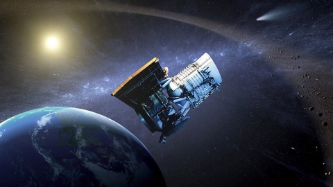 This artist's concept shows the Wide-field Infrared Survey Explorer, or WISE spacecraft, in its orbit around Earth. (NASA/JPL-Caltech)