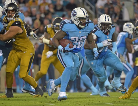 Tennessee Titans running back Antonio Andrews (26) carries the ball against the Jacksonville Jaguars during an NFL football game at EverBank Field November 19th, 2015. (Kirby Lee-USA TODAY Sports)