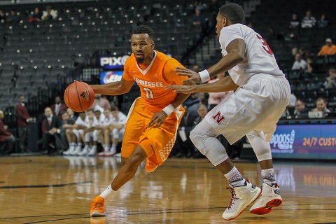 Tennessee Volunteers guard Kevin Punter (0) dribbles in front of Nebraska Cornhuskers guard Andrew White (3) during the consolation game at Barclays Center. Nebraska wins, 82-71. (Vincent Carchietta-USA TODAY Sports)