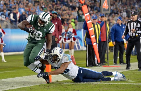 New York Jets running back John Conner (38) scores a touchdown against Tennessee Titans linebacker Wesley Woodyard (59) during the second half at LP Field. The Jets beat the Titans 16-11. (Don McPeak-USA TODAY Sports)