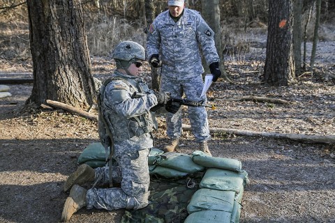 Pfc. Nicholas Vaughan, Company A, 1st Battalion, 327th Infantry Regiment, 1st Brigade Combat Team, 101st Airborne Division (Air Assault) performs a functions check on an M4 after performing remedial action during the red lane portion of the expert infantryman badge qualifications Tuesday, Feb. 3. Vaughan received a go at this station, performing the proper measures in 17 seconds. Soldiers are permitted 30 seconds. (Sgt. Samantha Parks, 1st Brigade Combat Team Public Affairs)