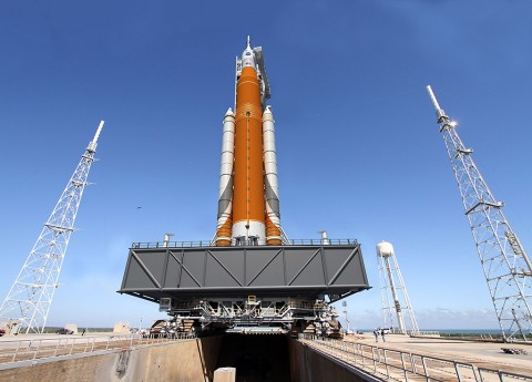 An artist illustration of NASA's Space Launch System rocket and Orion spacecraft on the mobile launcher at Launch Pad 39B at NASA's Kennedy Space Center in Florida. (NASA)