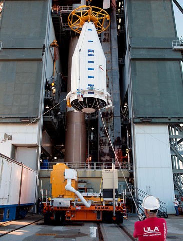 A crane lifts the Cygnus spacecraft, fitted inside a payload fairing, to the Vertical Integration Facility at Space Launch Complex 41 so the spacecraft can be bolted to the top of the waiting United Launch Alliance Atlas V rocket. Built by Orbital ATK, the Cygnus is a cargo-only spacecraft that will take about 7,300 pounds of experiments, equipment and supplies to the International Space Station. (United Launch Alliance)