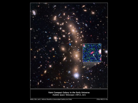 This is a Hubble Space Telescope view of a very massive cluster of galaxies, MACS J0416.1-2403, located roughly 4 billion light-years away and weighing as much as a million billion suns. The inset is an image of an extremely faint and distant galaxy that existed only 400 million years after the big bang. Hubble captured it because the gravitational lens makes the galaxy appear 20 times brighter than normal. (NASA, ESA, and L. Infante (Pontificia Universidad Catolica de Chile))