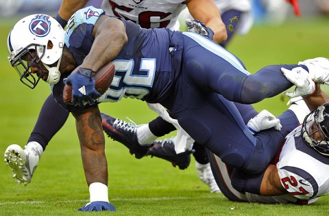 Tennessee Titans tight end Delanie Walker (82) extends for extra yardage after a reception during the first half against the Houston Texans at Nissan Stadium. (Christopher Hanewinckel-USA TODAY Sports)