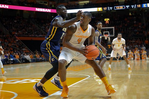 Tennessee Volunteers forward Armani Moore (4) controls the ball against the East Tennessee State Buccaneers during the game at Thompson-Boling Arena. (Randy Sartin-USA TODAY Sports)