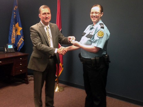 Montgomery County Sheriff John Fuson with new promoted Megan Corder.