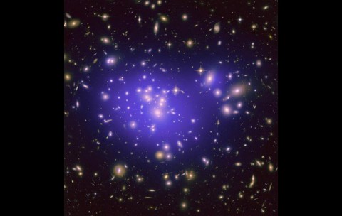 This image from NASA's Hubble Space Telescope shows the inner region of Abell 1689, an immense cluster of galaxies. Scientists say the galaxy clusters we see today have resulted from fluctuations in the density of matter in the early universe. (NASA/ESA/JPL-Caltech/Yale/CNRS)