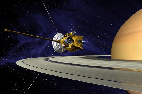 This is an artists concept of Cassini during the Saturn Orbit Insertion (SOI) maneuver, just after the main engine has begun firing. (NASA/JPL)