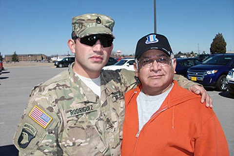 Staff Sgt. Tomas Rodriguez Jr., a squad leader with the 1st Battalion, 26th Infantry Regiment, 2nd Brigade Combat Team, 101st Airborne Division poses for a photo with his father, retired Staff Sgt. Tomas Rodriguez, at Fort Campbell, in 2013. Rodriguez Sr. also served in the 101st Airborne Division. (Courtesy Photo)