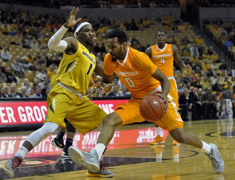 Tennessee Volunteers guard Kevin Punter Jr. (0) drives past Missouri Tigers guard Terrence Phillips (1) during the first half of a game at Mizzou Arena. (Timothy Tai-USA TODAY Sports)