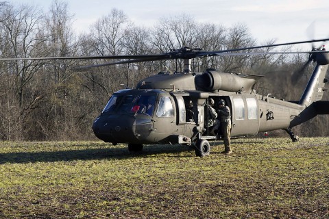 Soldiers from 58th Signal Company, 101st Special Troops Battalion, 101st Airborne Division (Air Assault) are safely secured into the aircraft before they take off the training area 5 on Fort Campbell, Ky., March 14, 2016. (U.S. Army Sgt. Neysa Canfield, 101st Sustainment Brigade Public Affairs)