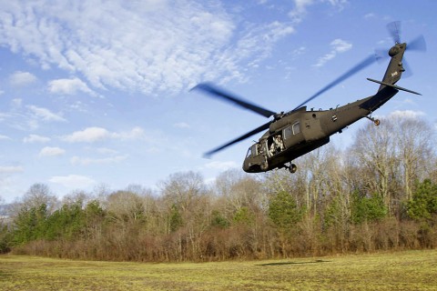 A UH-60 with Soldiers from 58th Signal Company, 101st Special Troops Battalion, 101st Airborne Division (Air Assault) takes off from training area 12 to transport the Soldiers so they can commence their week long training exercise on Fort Campbell, Ky., March 14, 2016. (U.S. Army Sgt. Neysa Canfield, 101st Sustainment Brigade Public Affairs)