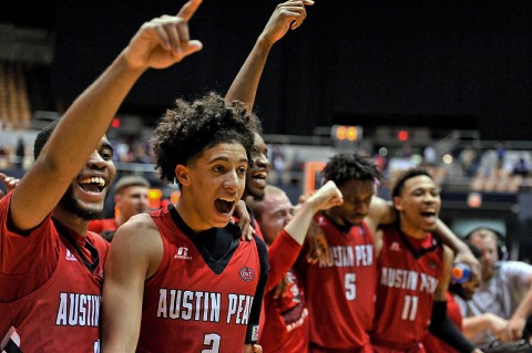 Austin Peay Governors guard Jared Savage (2) celebrates with teammates after defeating the Belmont Bruins during overtime of game five of the Ohio Valley Conference tournament at Municipal Auditorium. Austin Peay won 97-96 in overtime on March 4th, 2016. (Jim Brown-USA TODAY Sports)