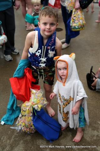 Two brothers with their prizes.