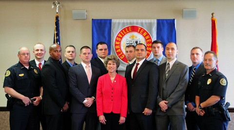 (L to R) DC Michael Parr, Tyler Weaver, Michael Trottman, Brian Hooker, Bruce Kilby II, David Knight, Mayor Kim McMillan, Seth Traughber, Renaldo Simoni, Adam Noble, Kirill Annikov, Nicholas Martin and DC Frankie Gray.