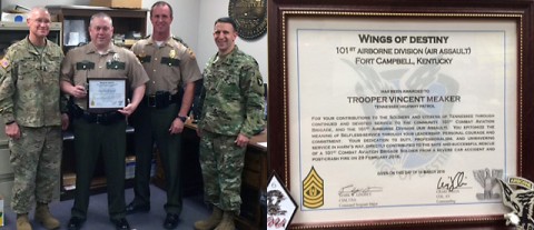 Tennessee Highway Patrol Trooper Vincent Meaker is presented the Wings of Destiny 101st Airborne certificate of appreciation for selfless-service. Tennessee Highway Patrol Trooper Vincent Meaker is presented the Wings of Destiny 101st Airborne certificate of appreciation for selfless-service.