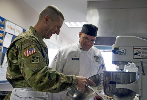 Sgt. Maj. of the Army Daniel A. Dailey prepares a meal with Spc. Gregory Becker, a food service specialist with 21st Brigade Engineer Battalion, 3rd Brigade Combat Team, 101st Airborne Division (Air Assault), at the Austin Peay State University culinary arts center, Fort Campbell, KY. Becker is currently competing for the second time in the Military Culinary Arts Competitive Training Event held at Fort Lee, VA. (Sgt. William White, 101st Airborne Division Public Affairs)