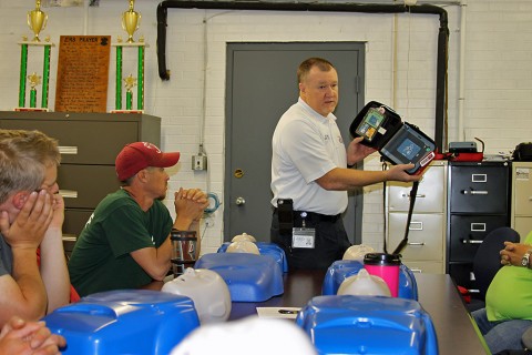 Montgomery County Parks and Recreation staff gets training by MCEMS Assistant Chief Bill Webb on how to use Automated External Defibrillators.