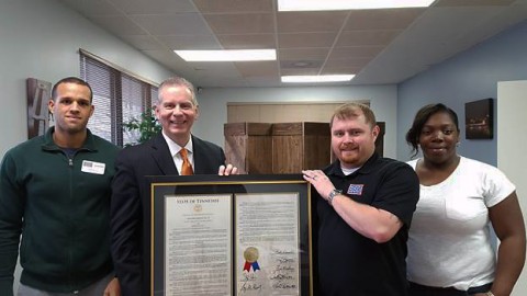 Tennessee Representative Joe Pitts presenting House Joint Resolution 550. (L to R) Emmanuel Toribio (UTO Volunteer), Joe Pitts, Bobby Thurman (USO RP/6 Scout), Tareasha Jones (USO Volunteer)